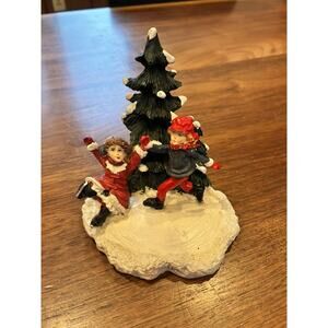 Mervyn's Christmas Village Square Snow Kids Ice Skating Flocked Tree Figurine